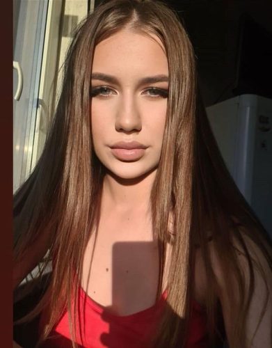 эскортница с рыжими волосами